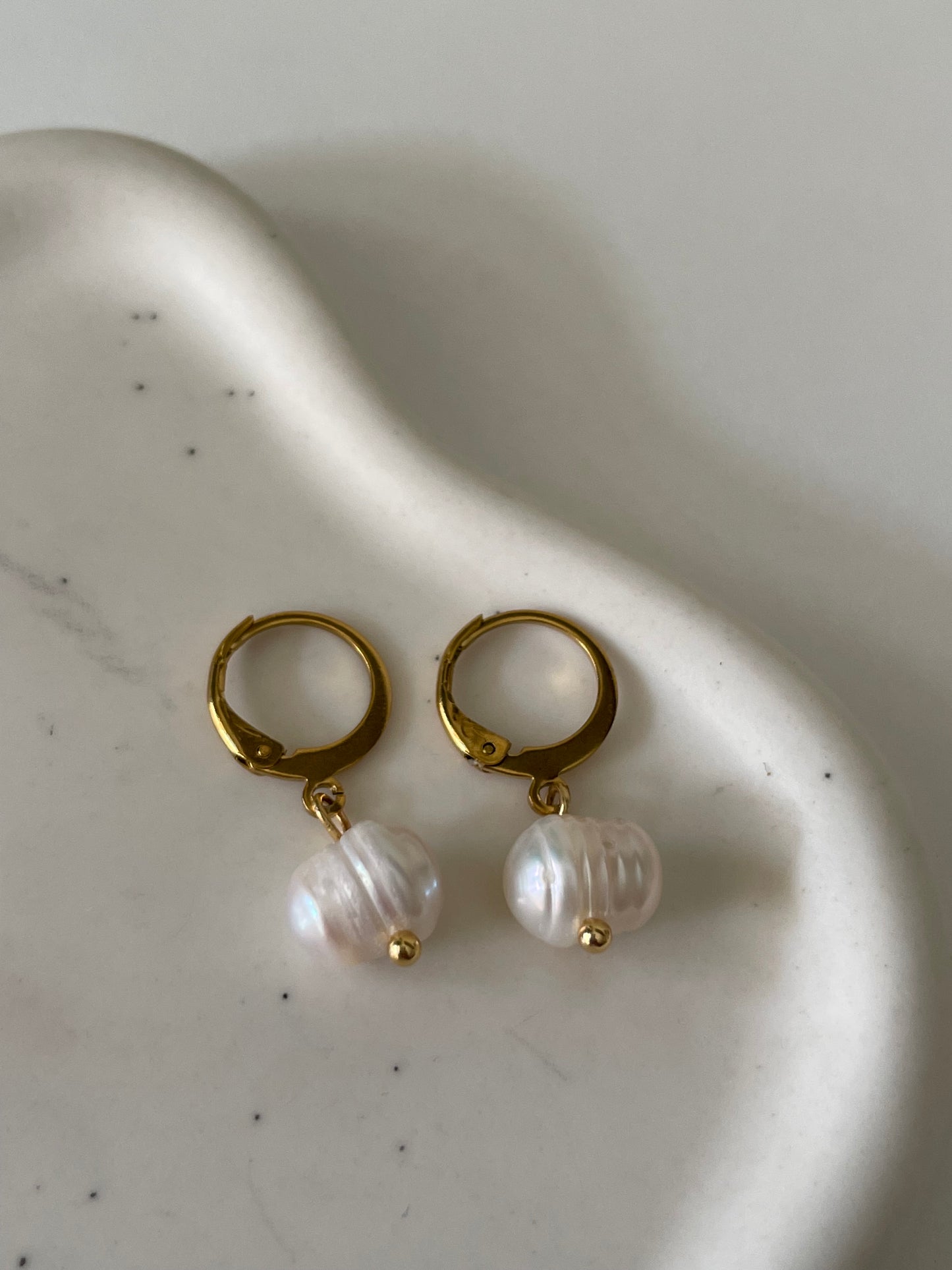 Pearl huggies earrings