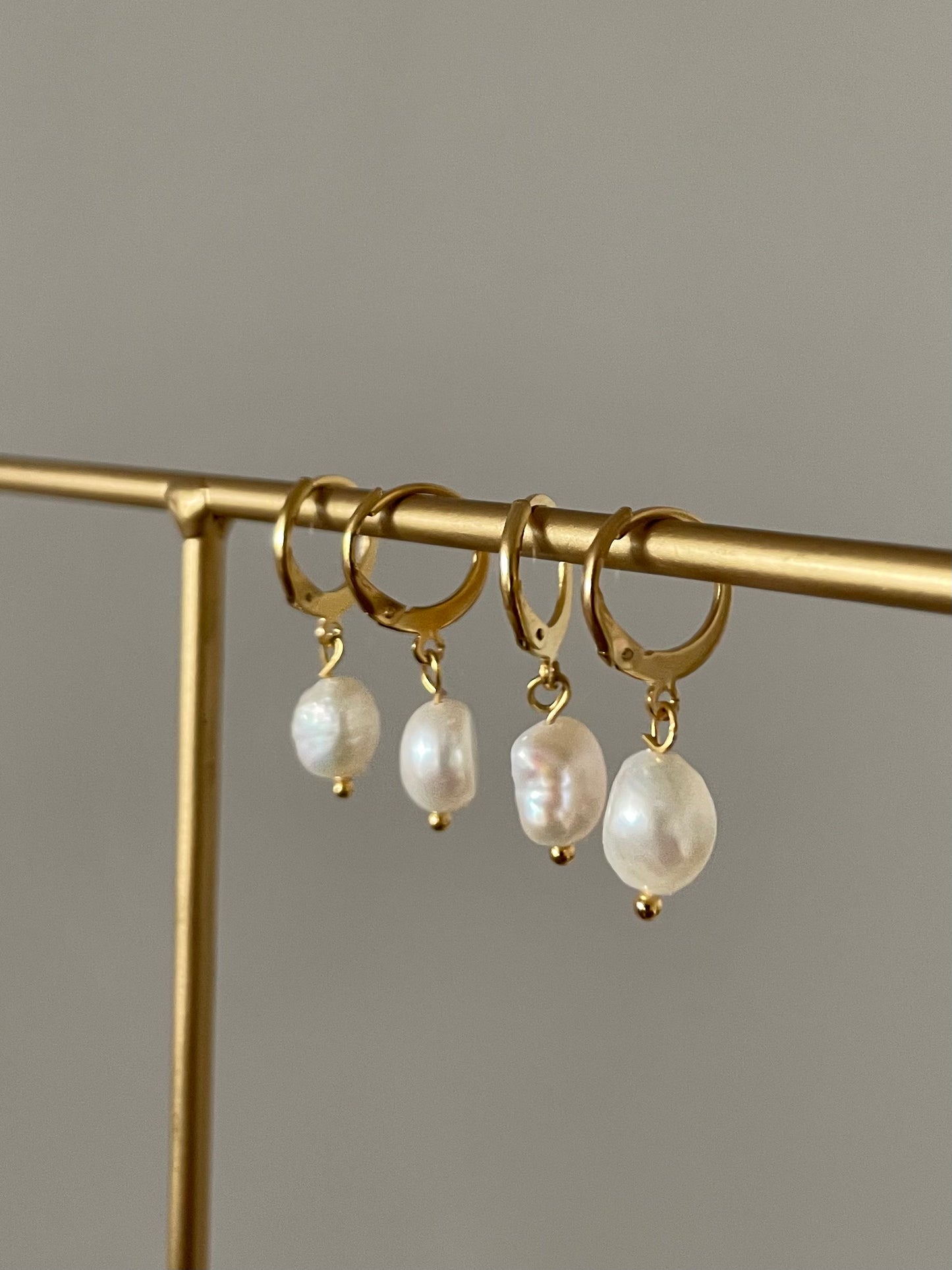 Pearl huggies earrings